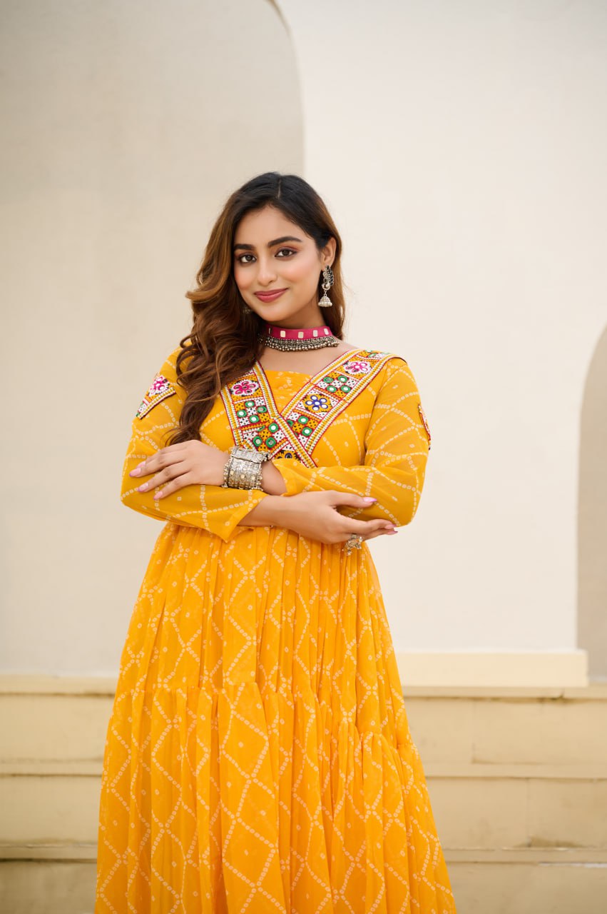 Yellow Bandhani Print Faux Georgette Gown with Kutchi Patchwork ClothsVilla