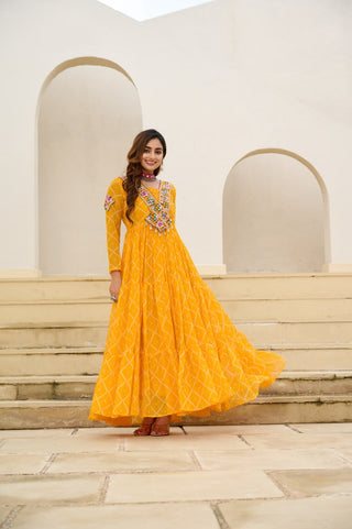 Yellow Bandhani Print Faux Georgette Gown with Kutchi Patchwork ClothsVilla