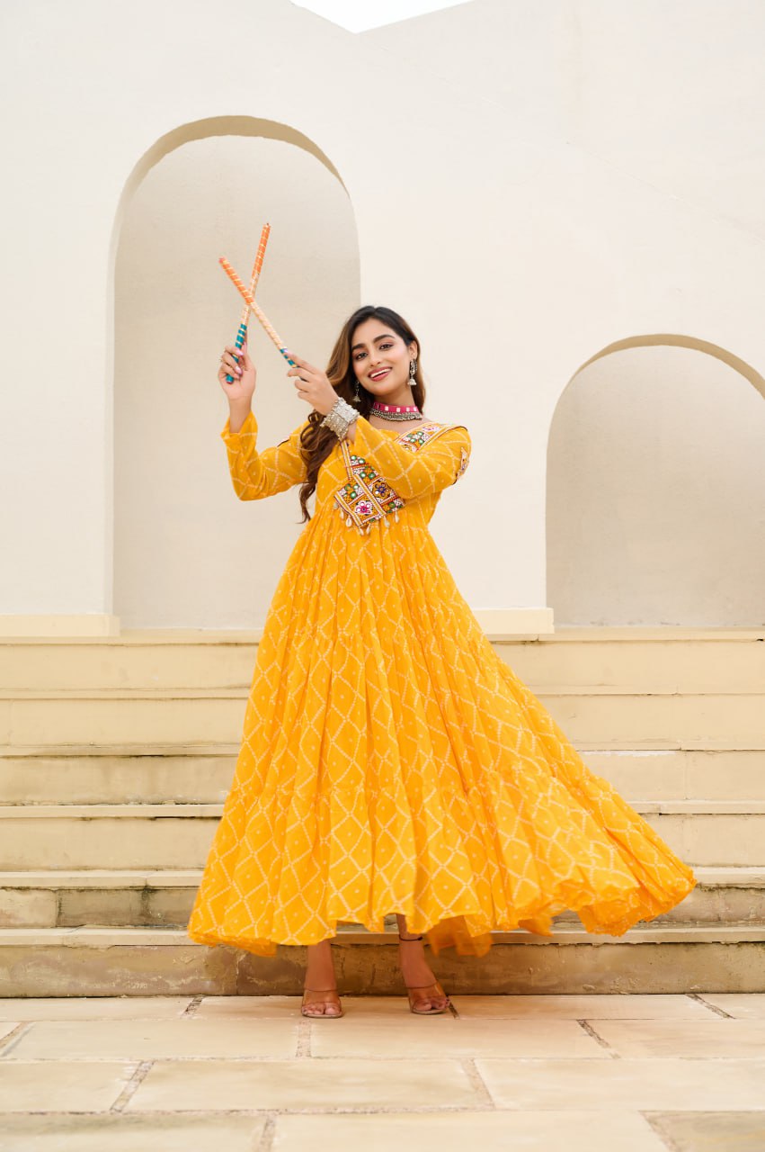 Yellow Bandhani Print Faux Georgette Gown with Kutchi Patchwork ClothsVilla