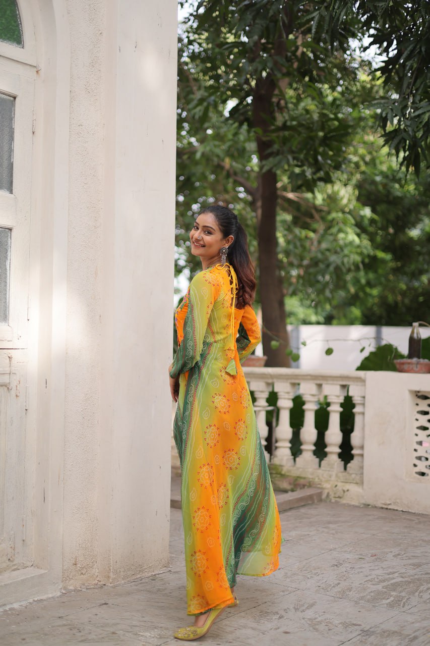 Yellow Bandhani Print Faux Georgette Kurti with Kutchi Patchwork ClothsVilla