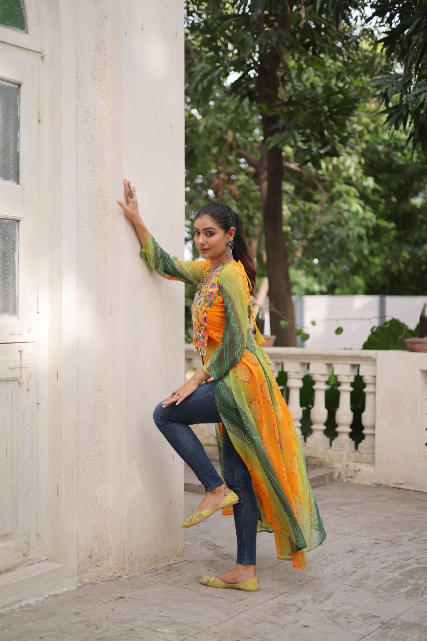 Yellow Bandhani Print Faux Georgette Kurti with Kutchi Patchwork ClothsVilla