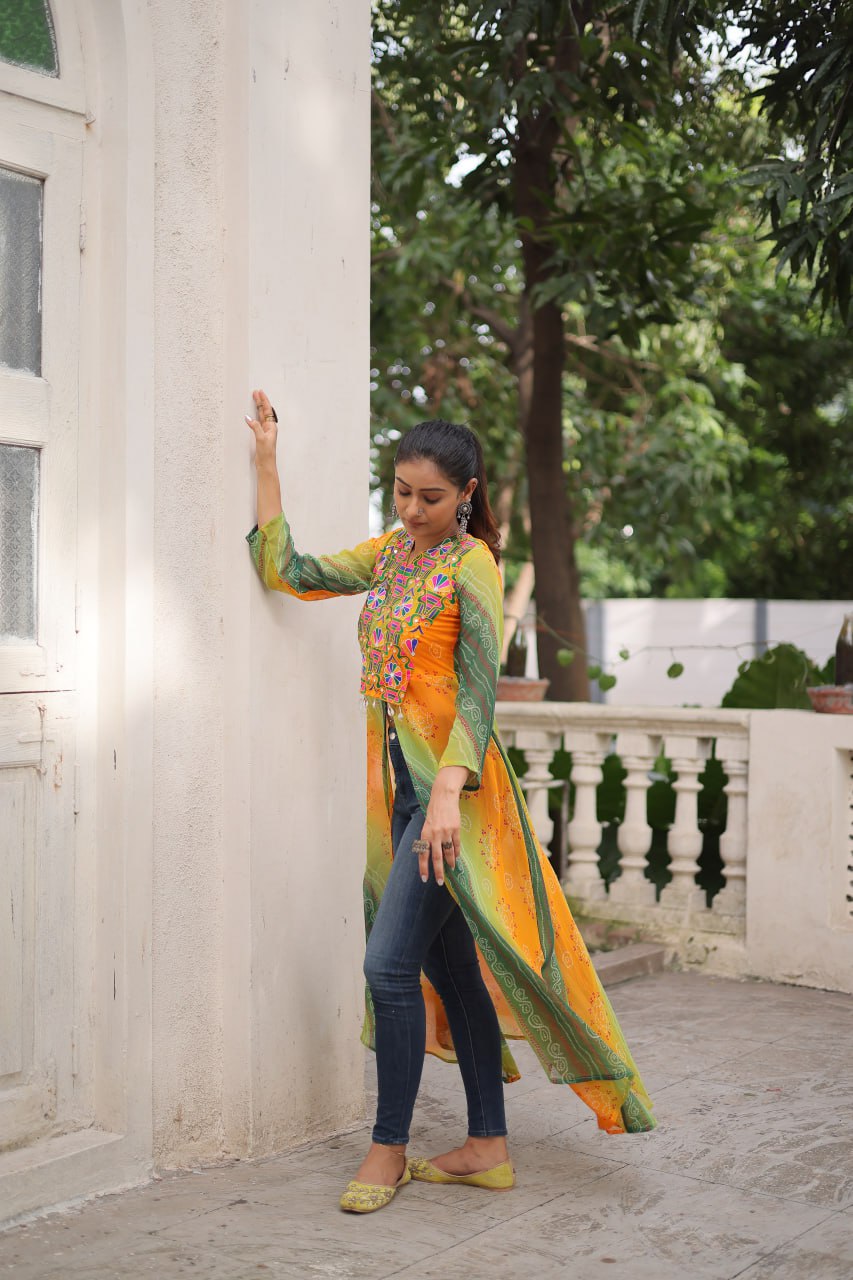 Yellow Bandhani Print Faux Georgette Kurti with Kutchi Patchwork ClothsVilla