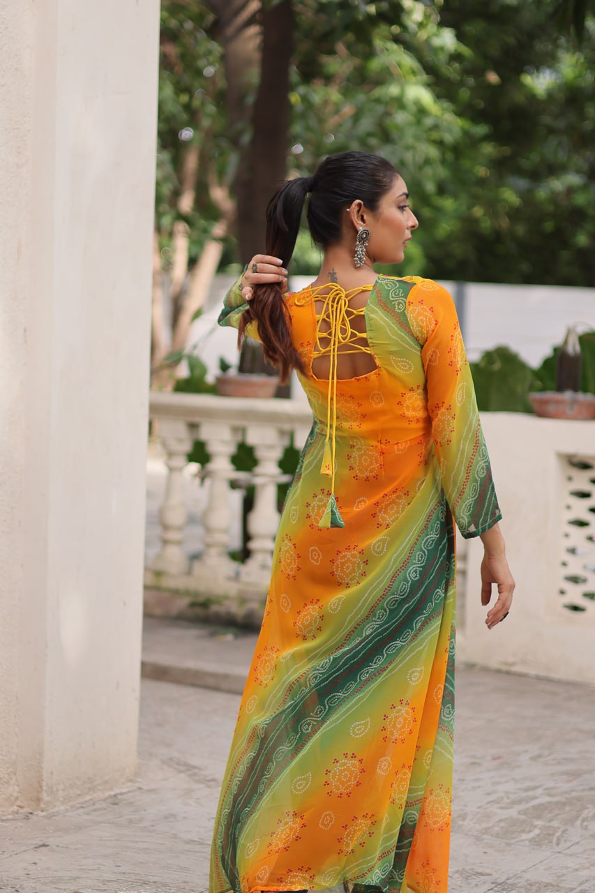 Yellow Bandhani Print Faux Georgette Kurti with Kutchi Patchwork ClothsVilla