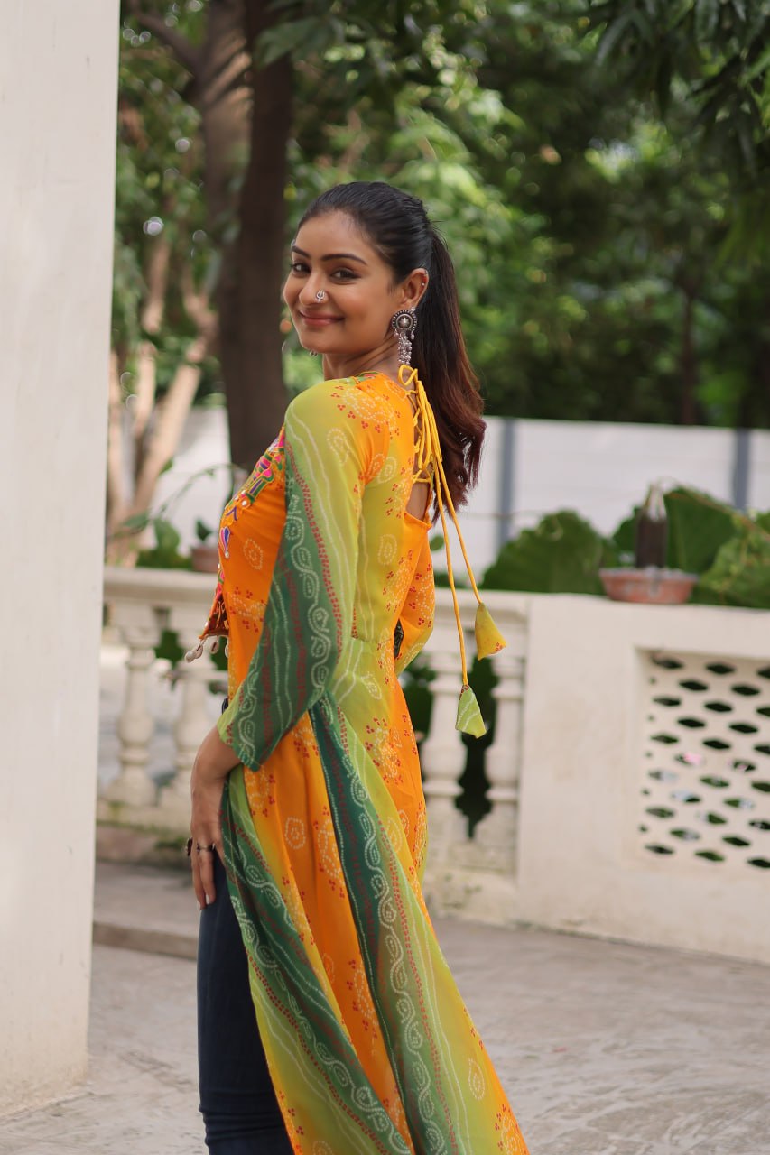 Yellow Bandhani Print Faux Georgette Kurti with Kutchi Patchwork ClothsVilla