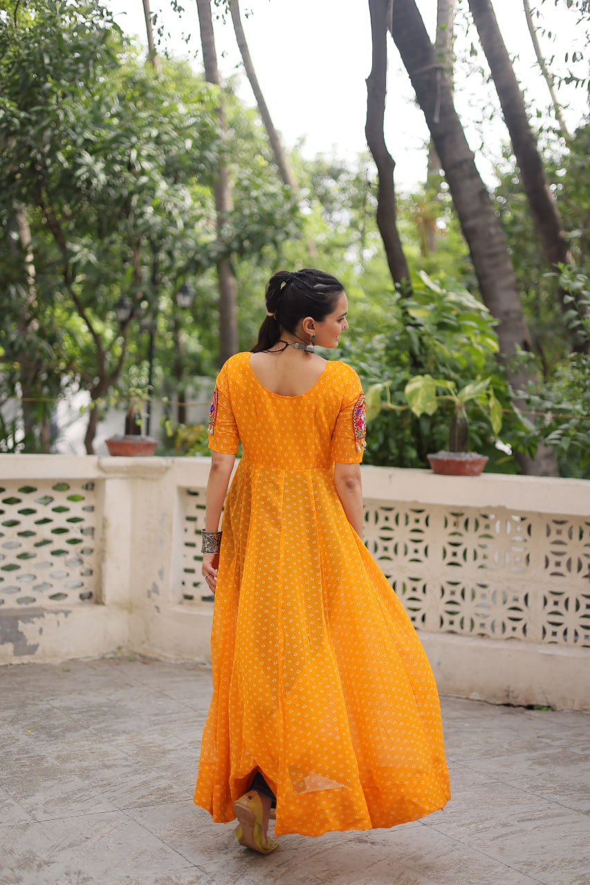 Yellow Bandhani Print Kurti with Kutchi Patchwork Detailing ClothsVilla