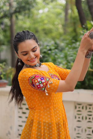 Yellow Bandhani Print Kurti with Kutchi Patchwork Detailing ClothsVilla