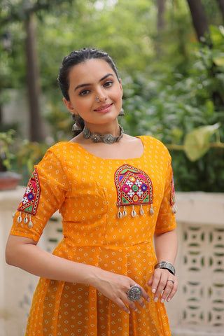 Yellow Bandhani Print Kurti with Kutchi Patchwork Detailing ClothsVilla
