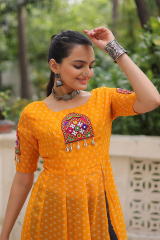 Yellow Bandhani Print Kurti with Kutchi Patchwork Detailing ClothsVilla