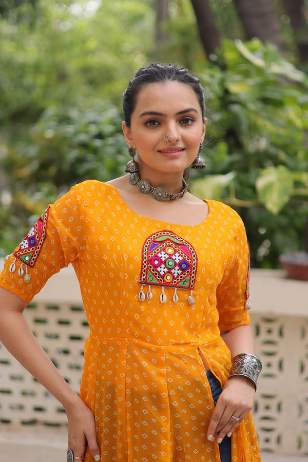 Yellow Bandhani Print Kurti with Kutchi Patchwork Detailing ClothsVilla