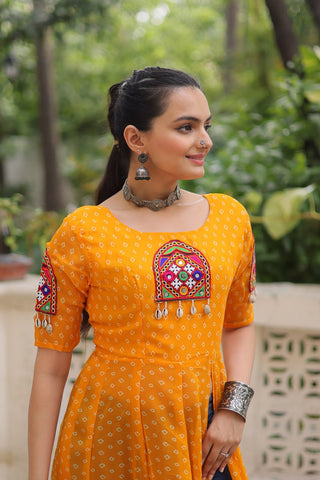Yellow Bandhani Print Kurti with Kutchi Patchwork Detailing ClothsVilla