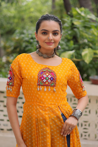 Yellow Bandhani Print Kurti with Kutchi Patchwork Detailing ClothsVilla