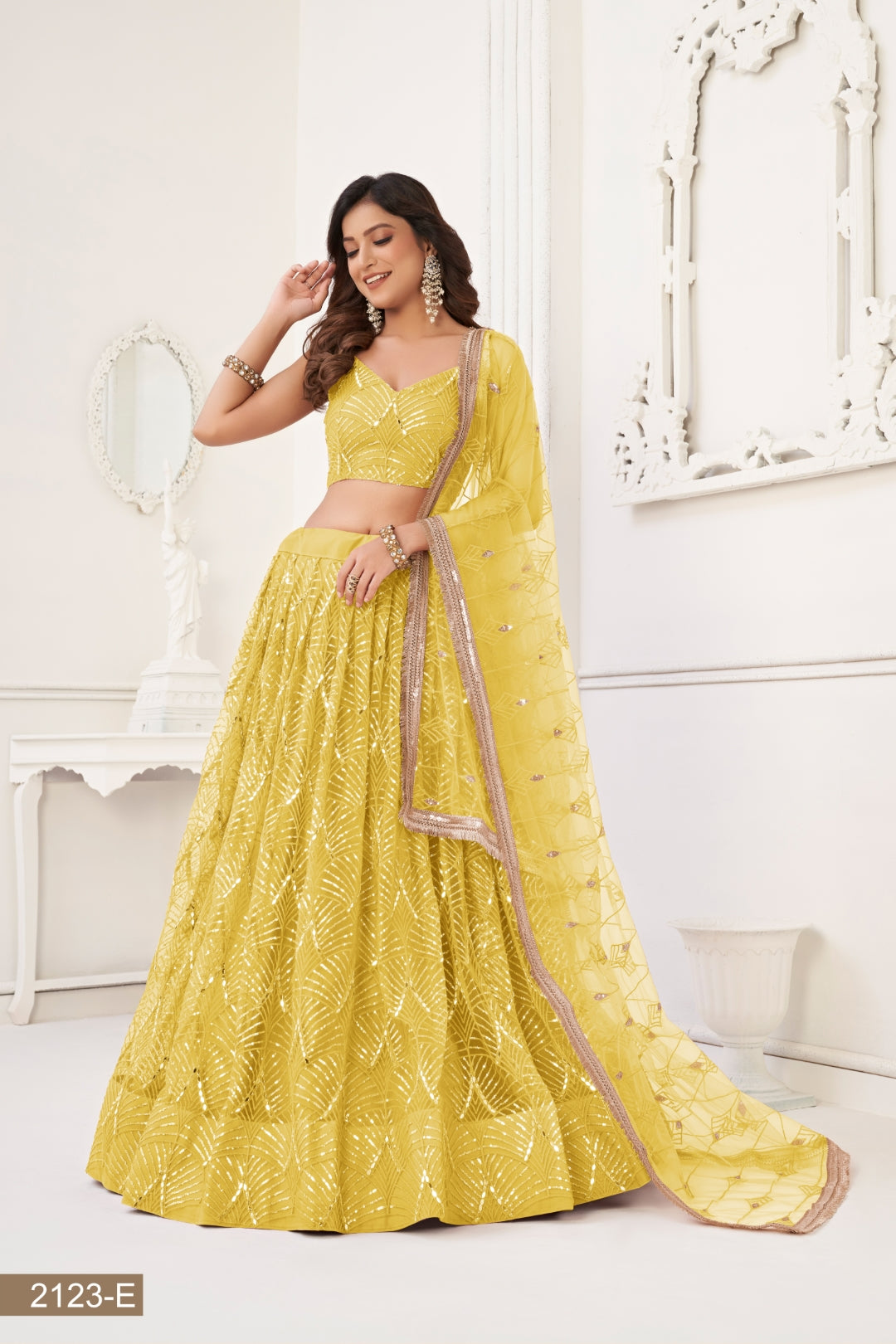 Yellow Butterfly Net Lehenga with Tone-to-Tone Thread Work and Mirror Embroidery ClothsVilla
