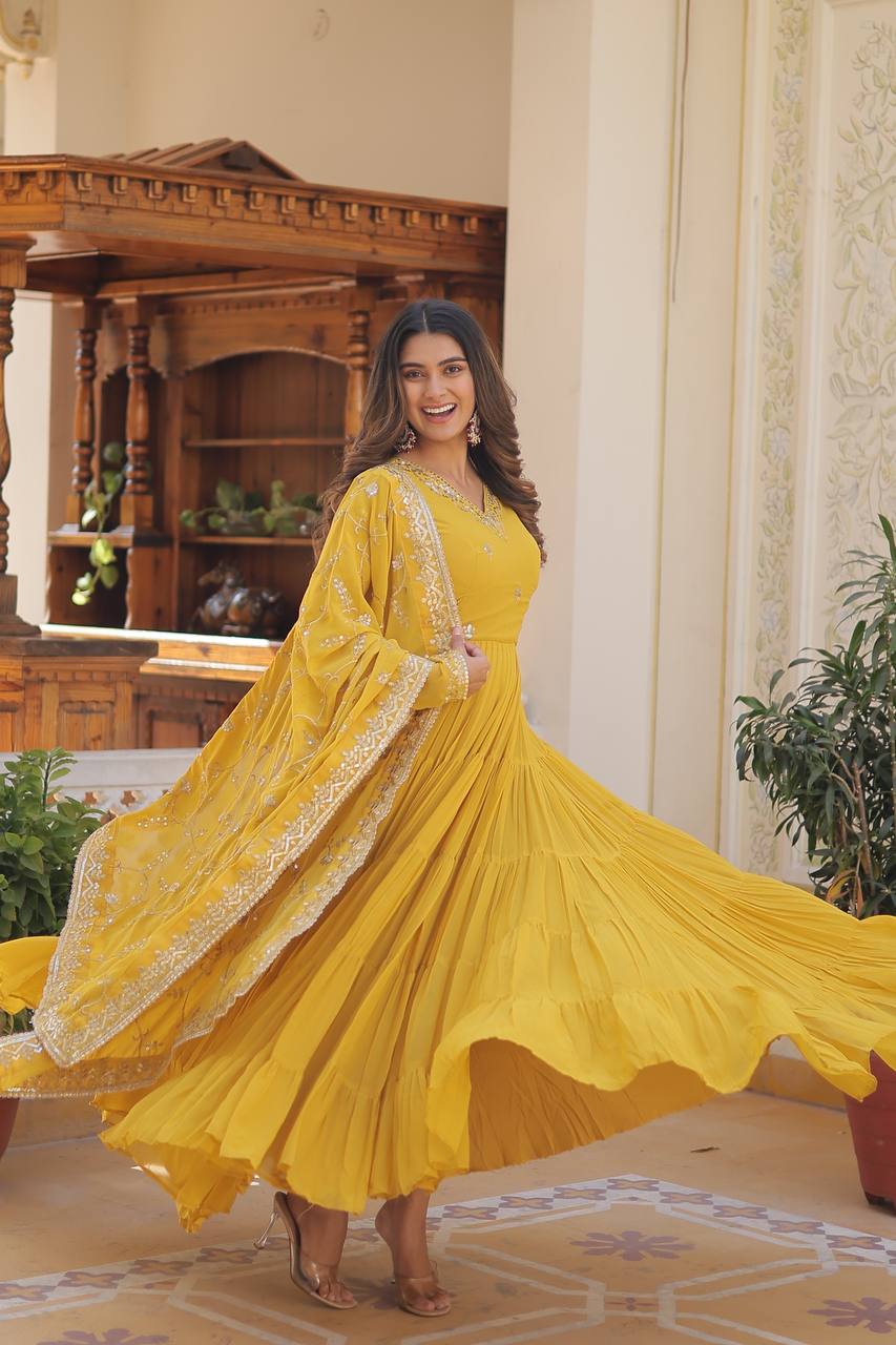 Yellow Captivating Unique Colored Faux Georgette Embroidered Gown with Sequined Dupatta ClothsVilla