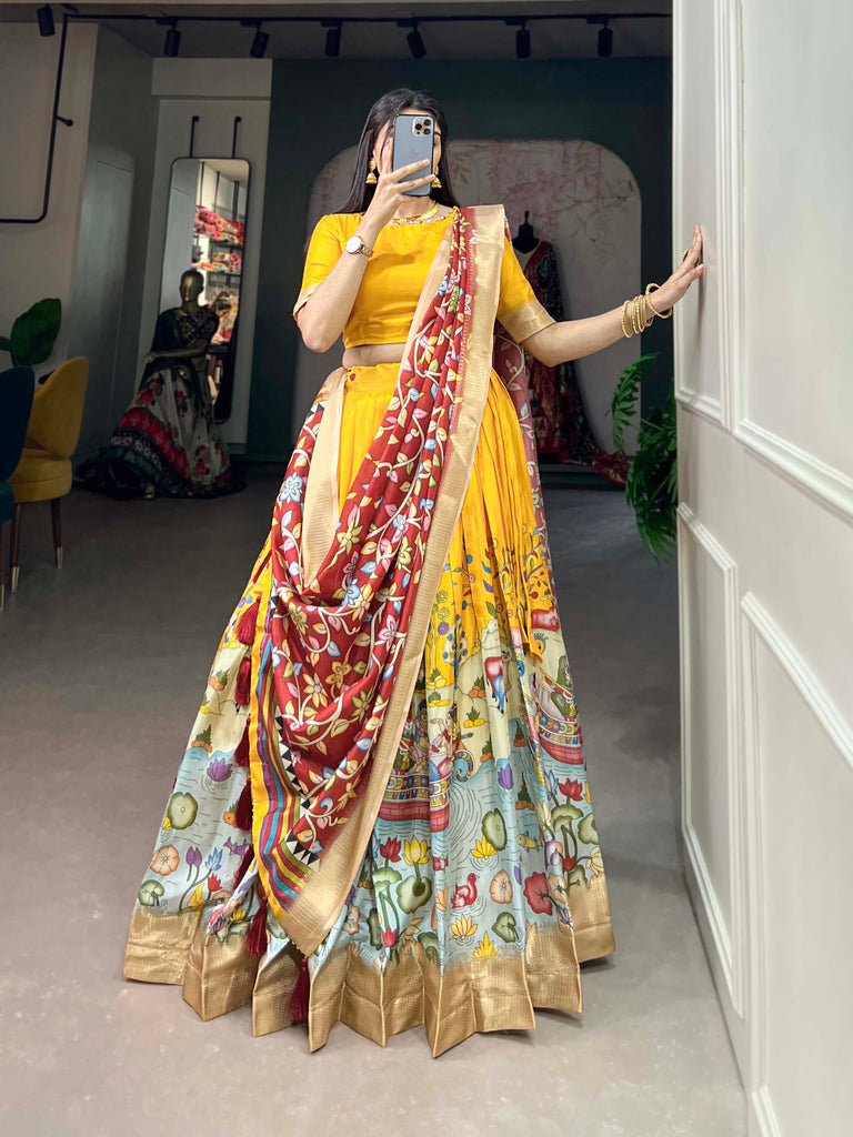 Alluring Yellow Dola Silk Lehenga Choli with Enchanting Kalamkari Prints ClothsVilla