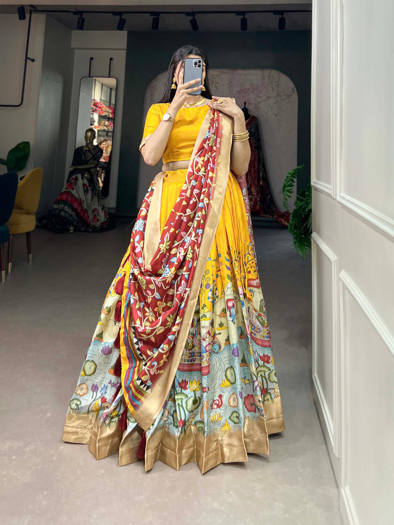 Alluring Yellow Dola Silk Lehenga Choli with Enchanting Kalamkari Prints ClothsVilla