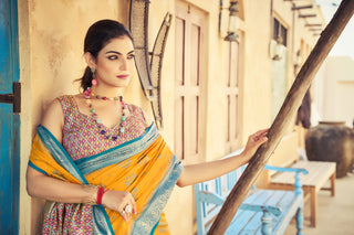 Yellow Elegant Banarasi Silk Blend Saree with Zari Woven Design ClothsVilla