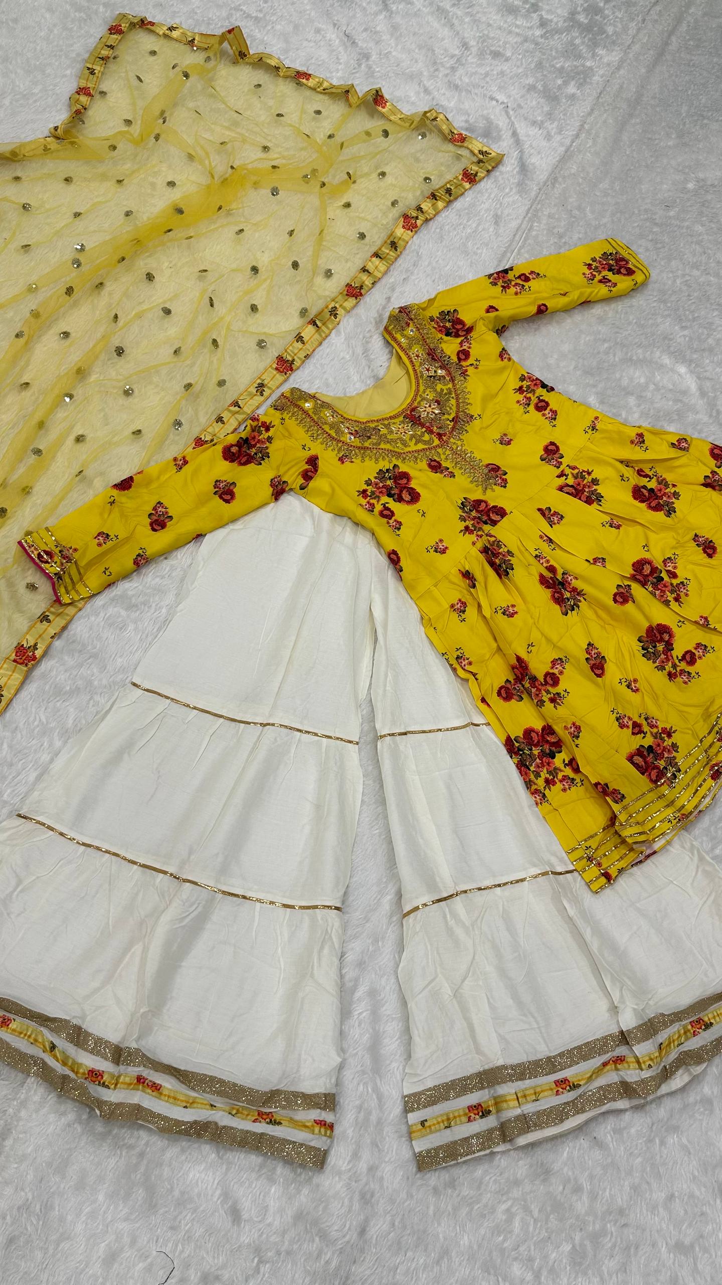 Yellow Elegant Crepe Silk Digital Print Top with Rayon Sharara & Embroidered Net Dupatta ClothsVilla