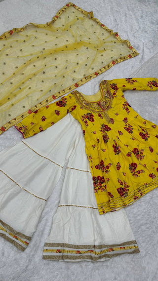 Yellow Elegant Crepe Silk Digital Print Top with Rayon Sharara & Embroidered Net Dupatta ClothsVilla
