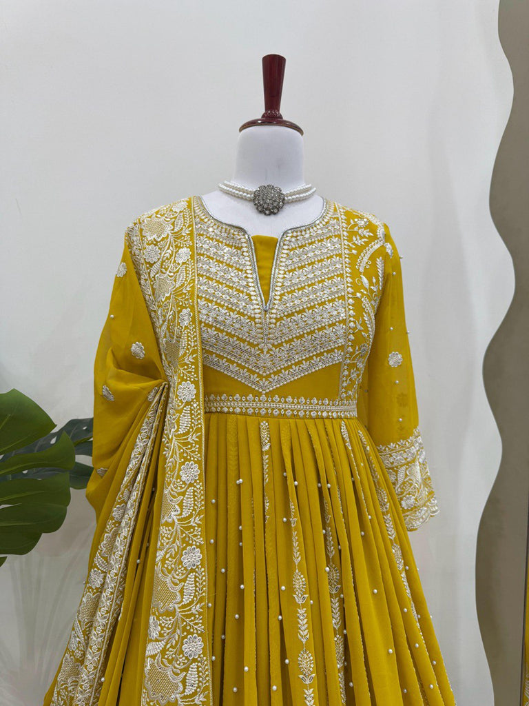 Yellow Elegant Faux Georgette Thread & Sequin Embellished Suit Set with Rivet Moti Detailing ClothsVilla