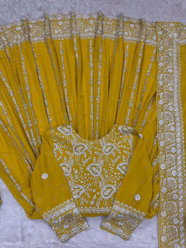Yellow Elegant Faux Georgette Thread & Sequin Embellished Suit Set with Rivet Moti Detailing ClothsVilla