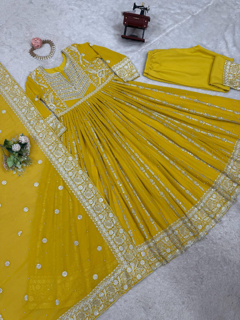Yellow Elegant Faux Georgette Thread & Sequin Embellished Suit Set with Rivet Moti Detailing ClothsVilla