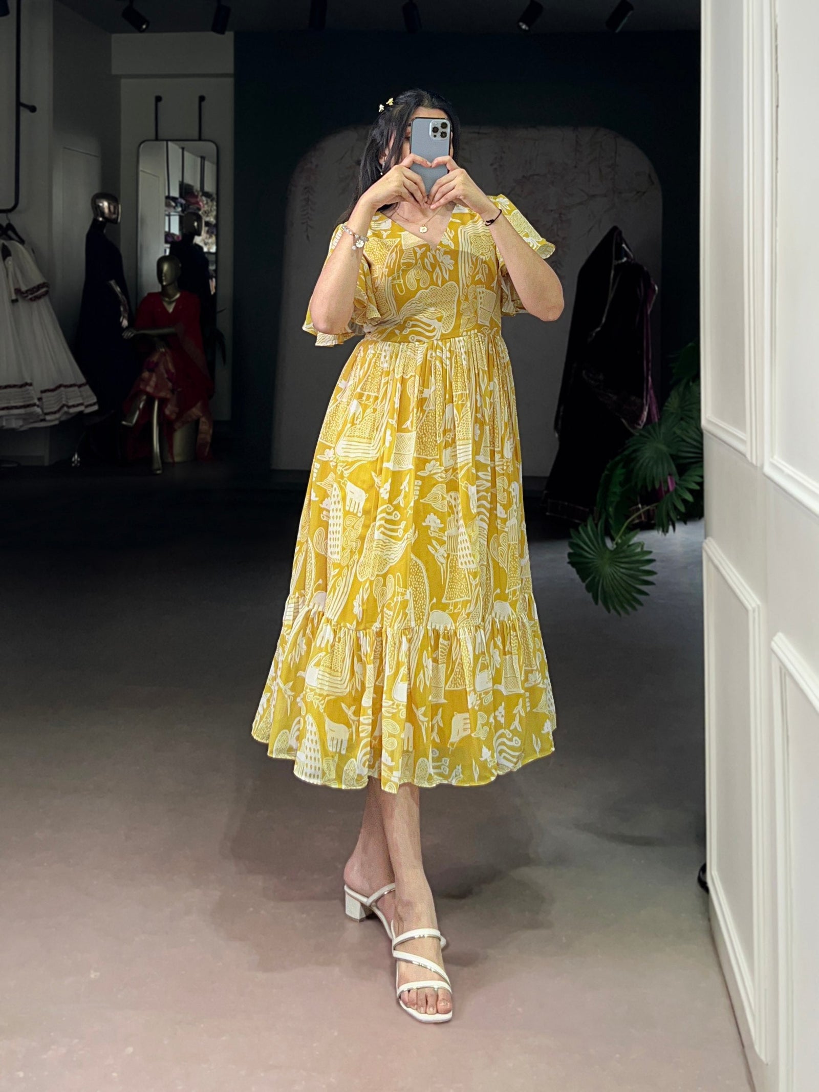 Yellow Elegant Georgette Printed Frock with  Flair & Micro Crepe Lining ClothsVilla