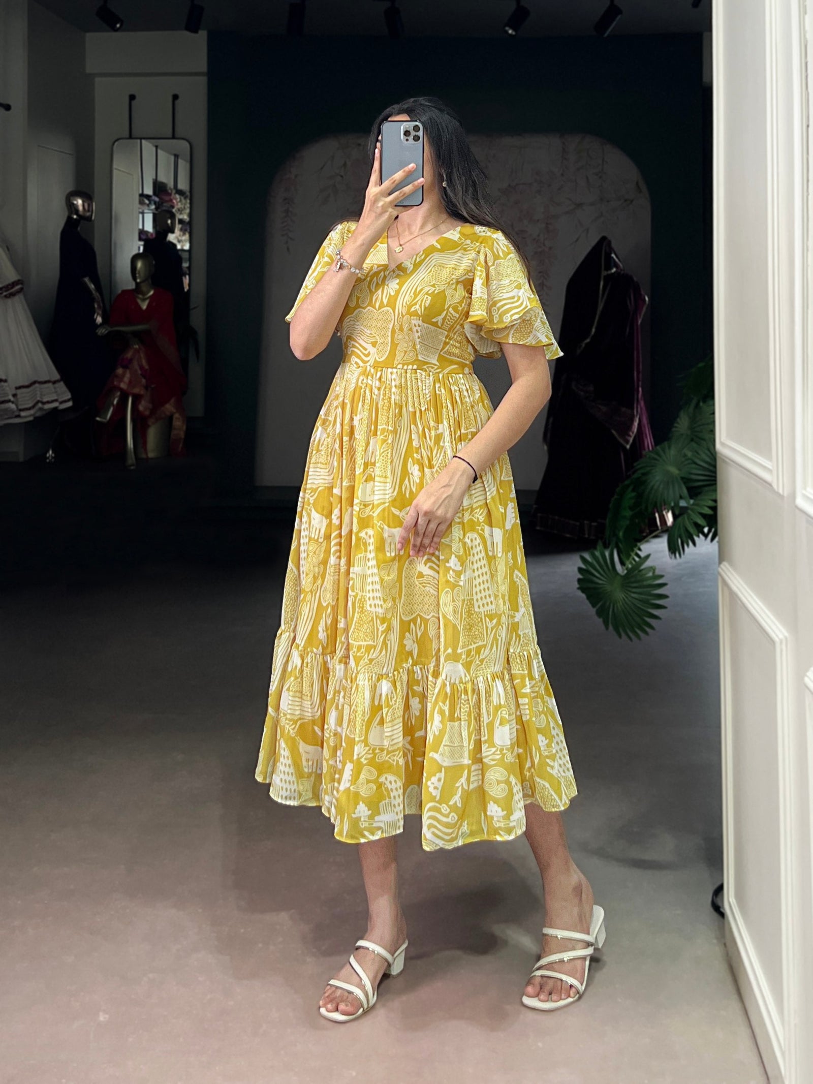 Yellow Elegant Georgette Printed Frock with  Flair & Micro Crepe Lining ClothsVilla