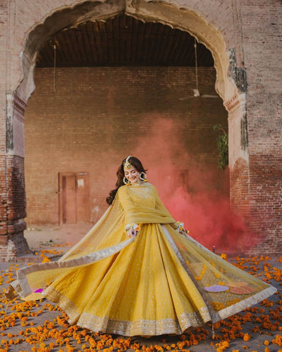 Yellow Elegant Heavy Chinon Silk Embroidered Gown Set with Tassel Sleeves, Bottom & Butterfly Net Dupatta ClothsVilla