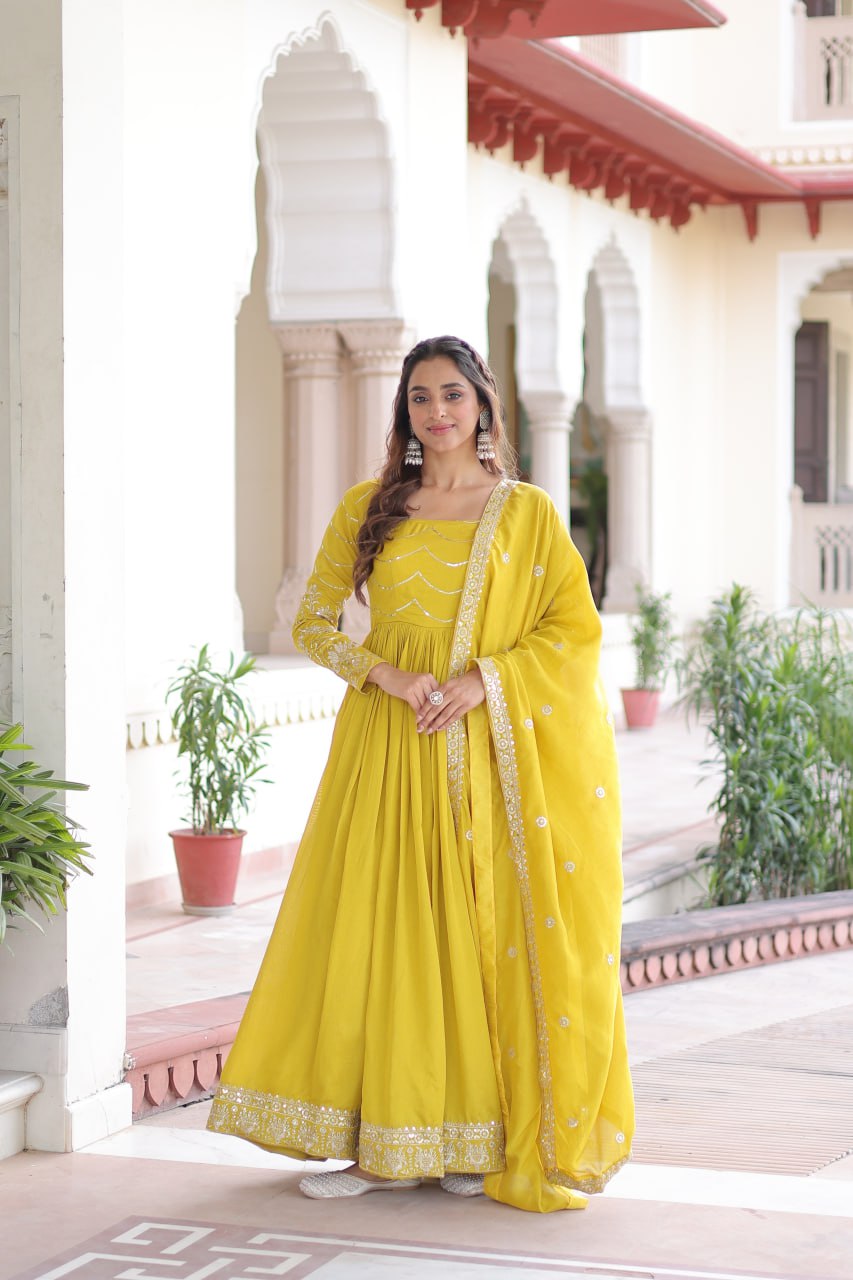 Yellow Elegant Vichitra Silk Sequin Embroidered Gown with Dupatta – Designer Full-Sleeve Square Neck Gown with Cotton Lining & 3-Meter Flair ClothsVilla