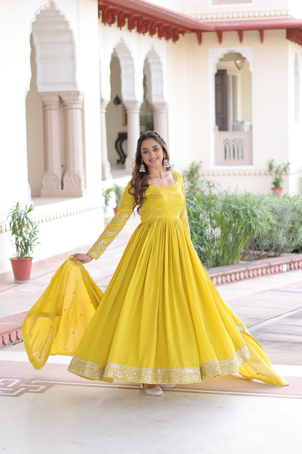 Yellow Elegant Vichitra Silk Sequin Embroidered Gown with Dupatta – Designer Full-Sleeve Square Neck Gown with Cotton Lining & 3-Meter Flair ClothsVilla