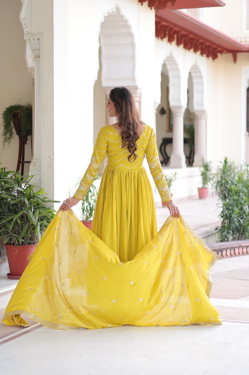 Yellow Elegant Vichitra Silk Sequin Embroidered Gown with Dupatta – Designer Full-Sleeve Square Neck Gown with Cotton Lining & 3-Meter Flair ClothsVilla