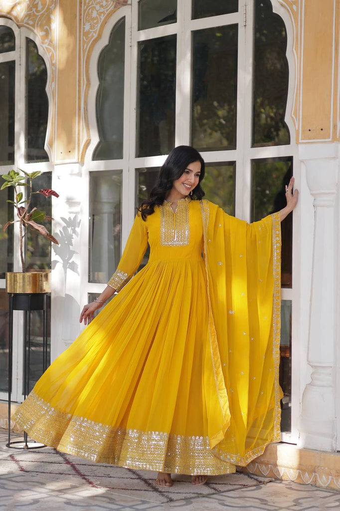 Yellow Faux Blooming Georgette Gown with Dupatta Clothsvilla