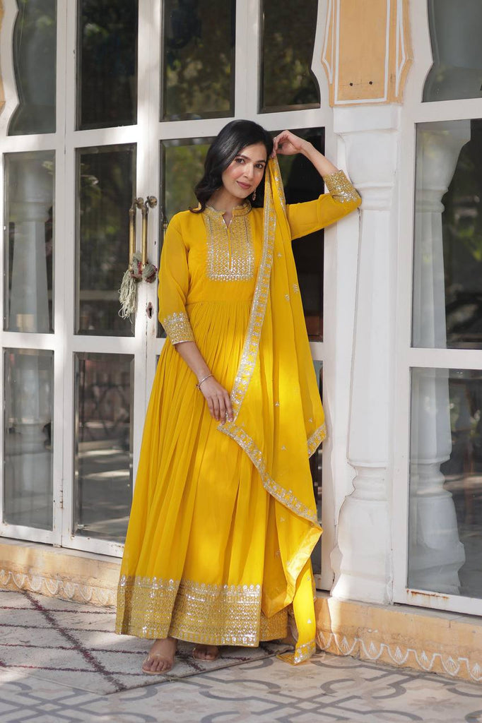 Yellow Faux Blooming Georgette Gown with Dupatta Clothsvilla