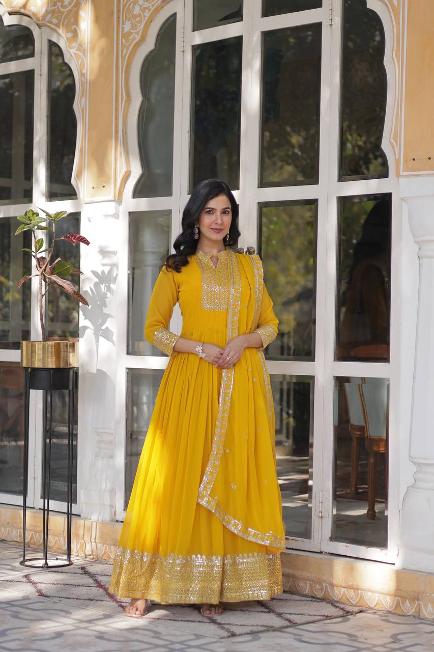 Yellow Faux Blooming Georgette Gown with Dupatta Clothsvilla Main image
