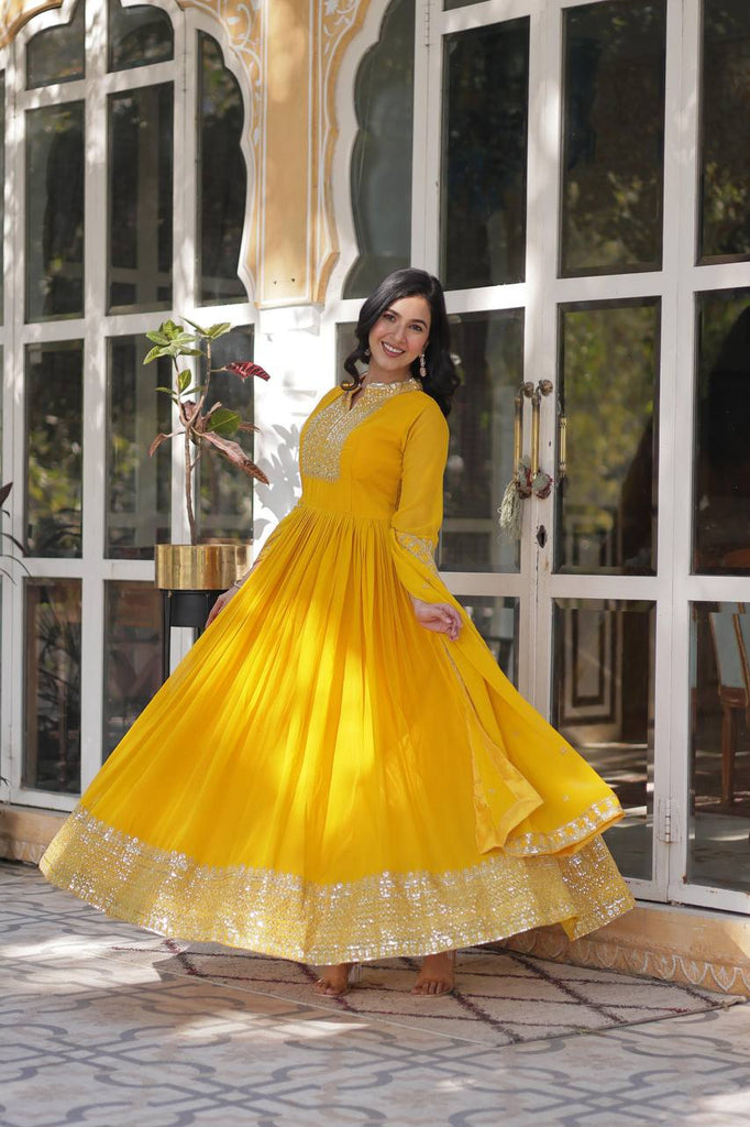 Yellow Faux Blooming Georgette Gown with Dupatta Clothsvilla