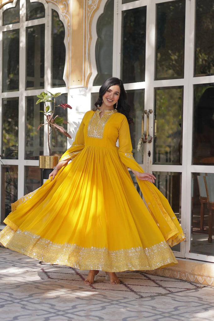 Yellow Faux Blooming Georgette Gown with Dupatta Clothsvilla