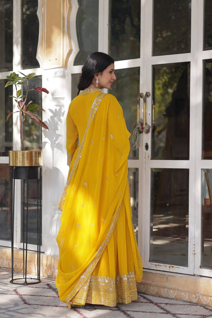 Yellow Faux Blooming Georgette Gown with Dupatta Clothsvilla