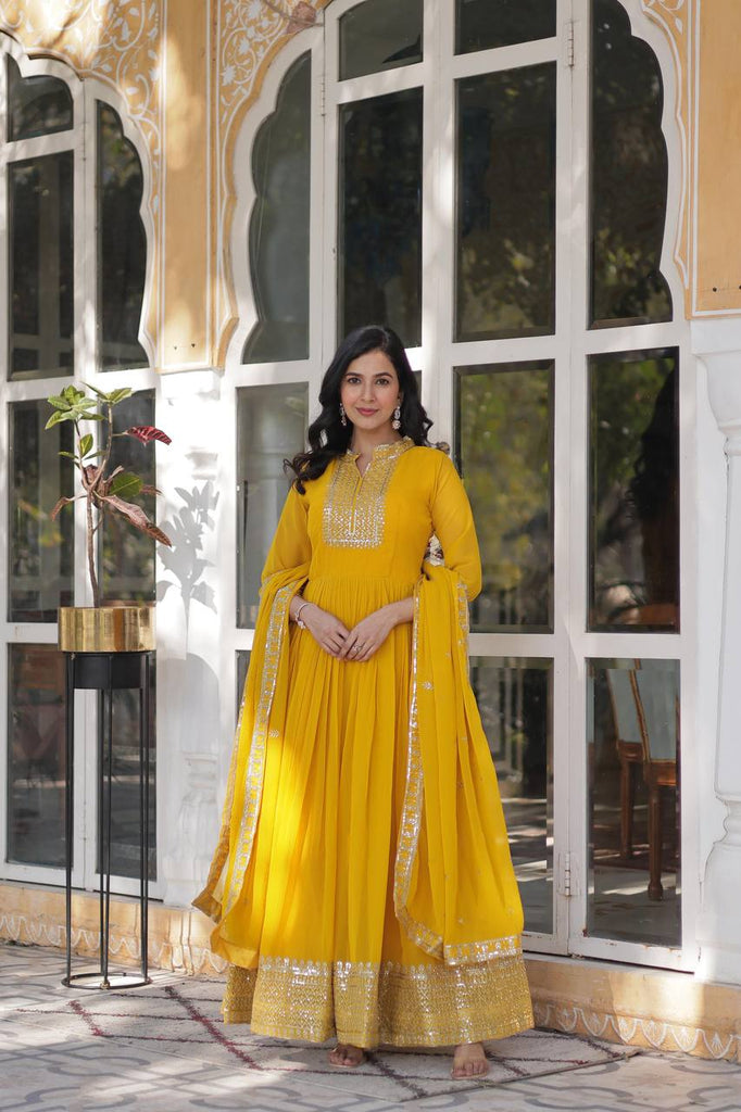 Yellow Faux Blooming Georgette Gown with Dupatta Clothsvilla