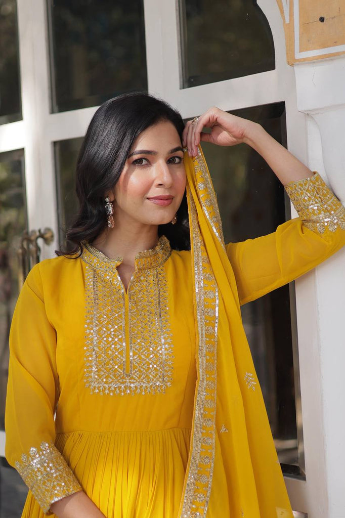 Yellow Faux Blooming Georgette Gown with Dupatta Clothsvilla