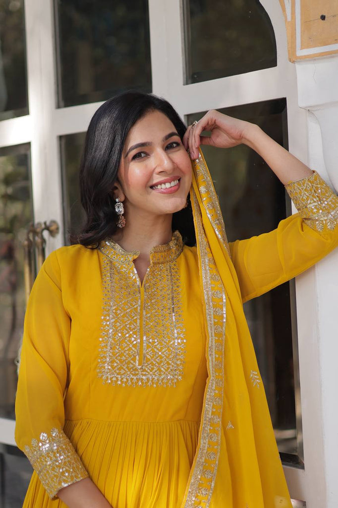 Yellow Faux Blooming Georgette Gown with Dupatta Clothsvilla