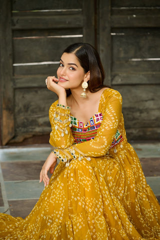 Yellow Faux Georgette Bandhani Print Gown with Kutchi Patchwork – Full Sleeves, 12 Meter Flair, Cotton Lining ClothsVilla