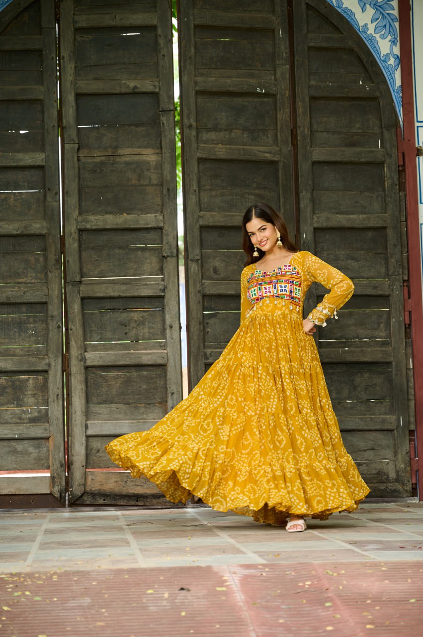Yellow Faux Georgette Bandhani Print Gown with Kutchi Patchwork – Full Sleeves, 12 Meter Flair, Cotton Lining ClothsVilla