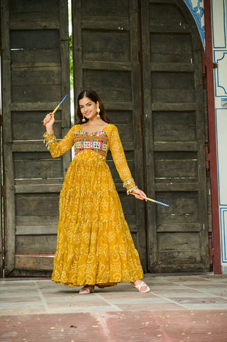 Yellow Faux Georgette Bandhani Print Gown with Kutchi Patchwork – Full Sleeves, 12 Meter Flair, Cotton Lining ClothsVilla
