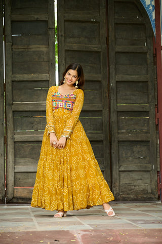 Yellow Faux Georgette Bandhani Print Gown with Kutchi Patchwork – Full Sleeves, 12 Meter Flair, Cotton Lining ClothsVilla