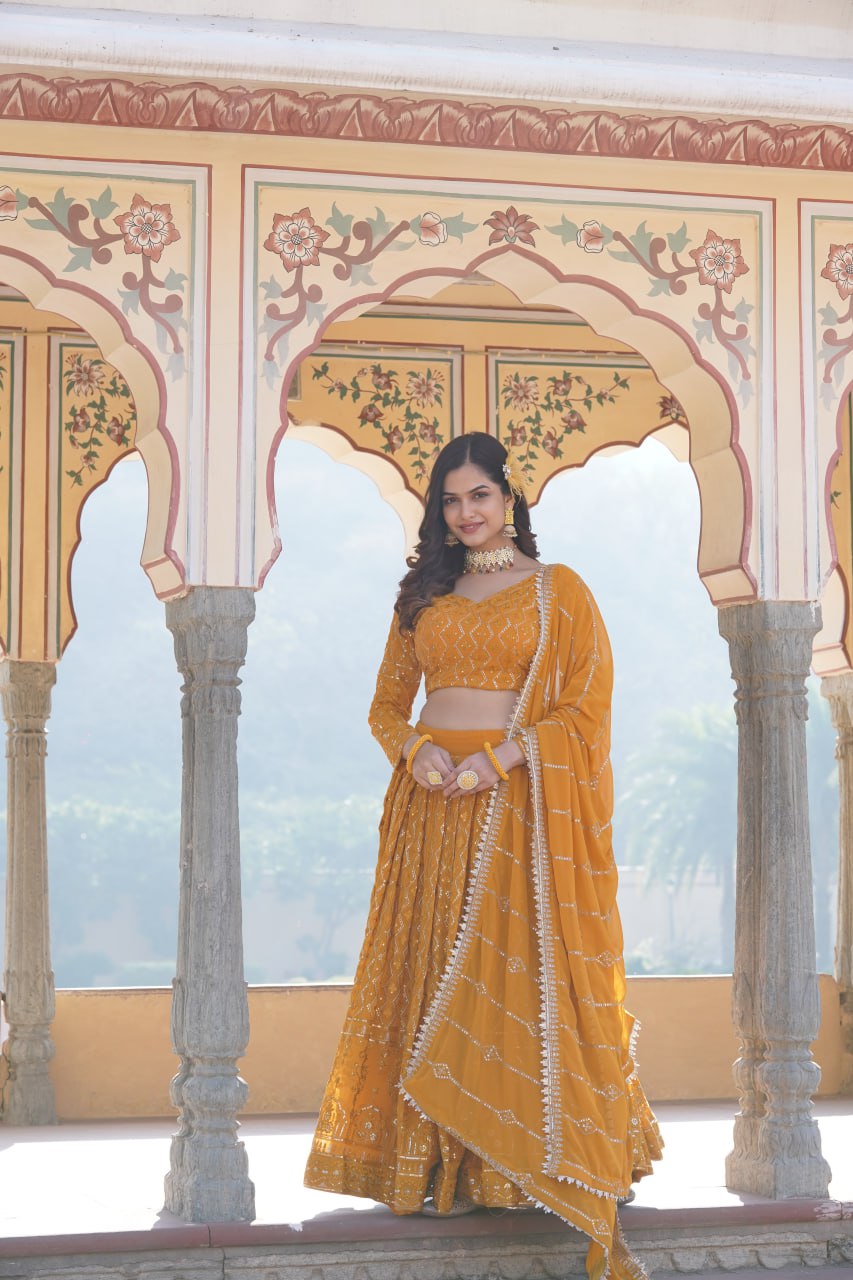 Shimmering Yellow Faux Georgette Lehenga Choli with Sequins & Thread Work ClothsVilla