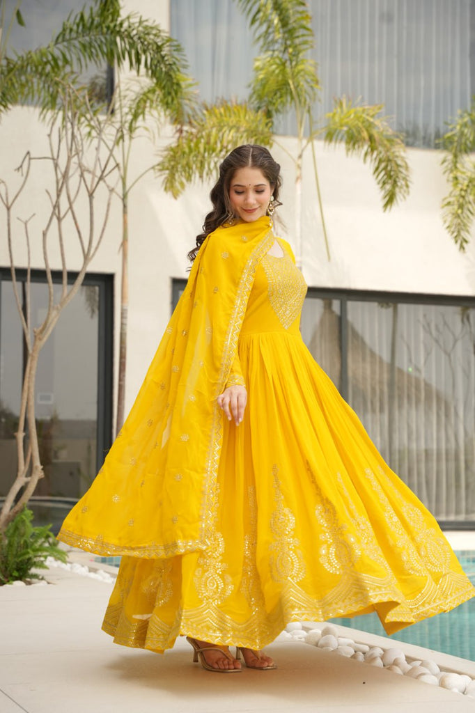 Yellow Graceful Faux Blooming Embroidered Gown with Sequins Dupatta – Fully Stitched Elegance ClothsVilla