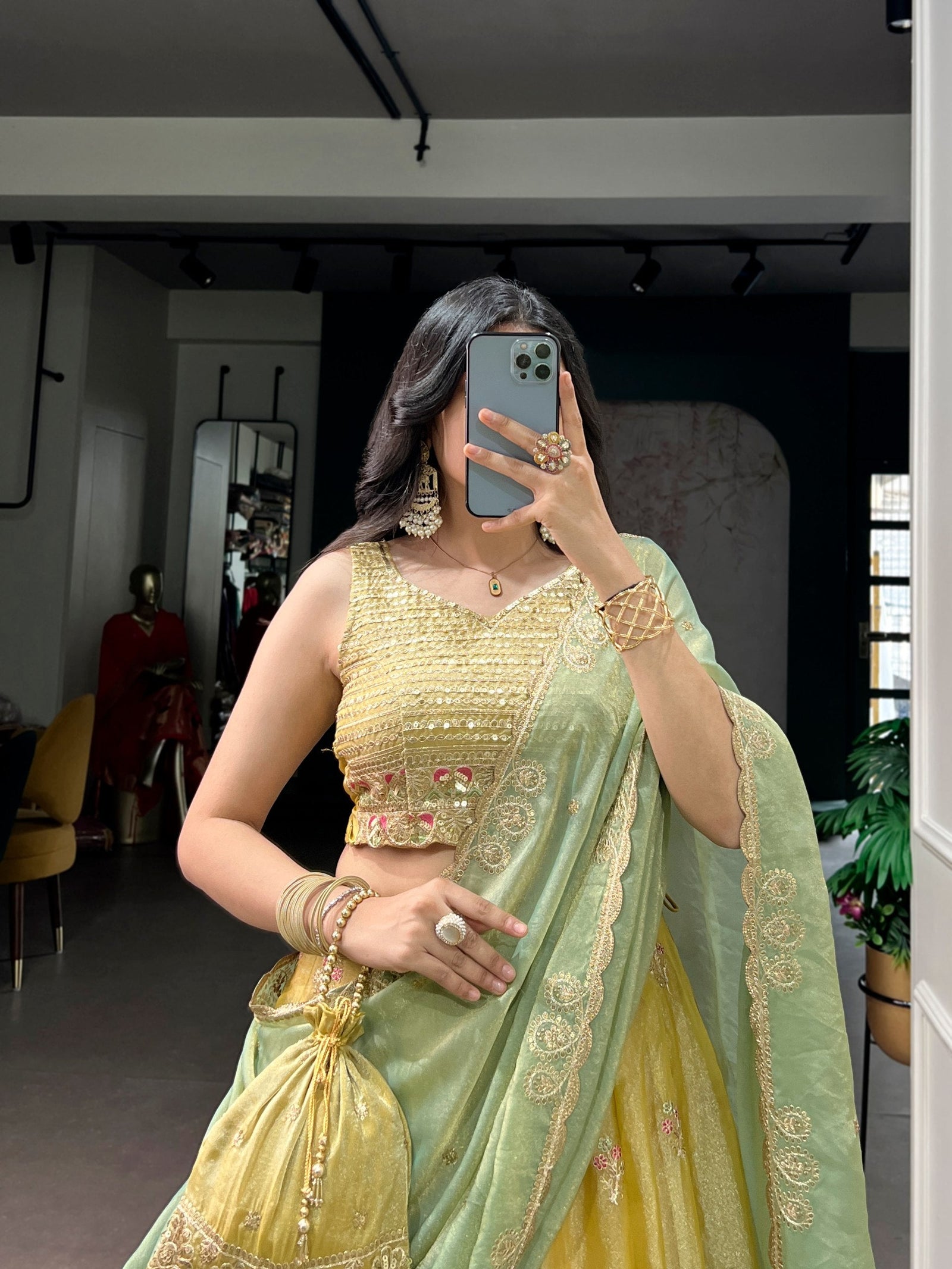 Yellow Moss Silk Embroidered Lehenga with Batwa ClothsVilla