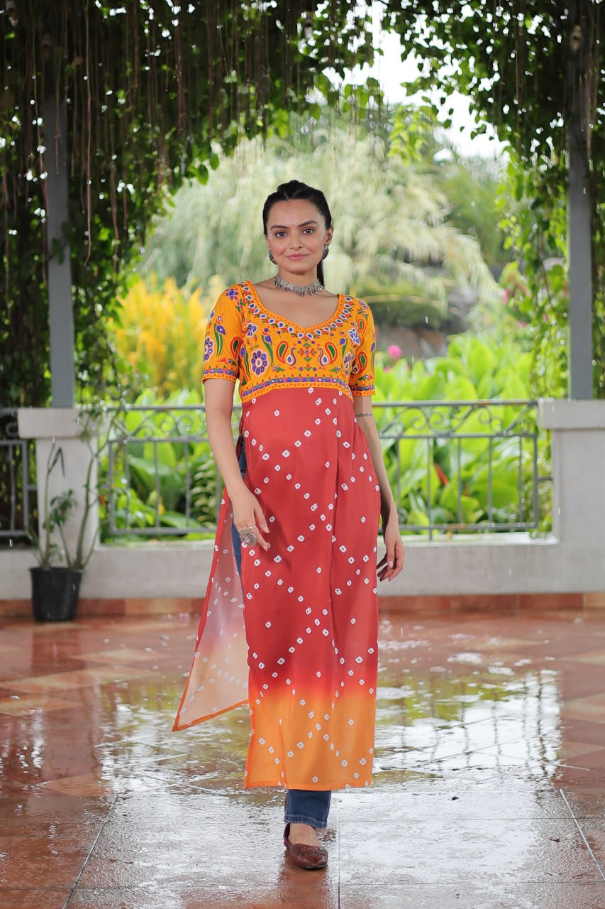 Yellow & Peach shade Navratri Special Printed Rayon Kurti with Kutchi Gamthi Embroidery & Pan Neck ClothsVilla Main image