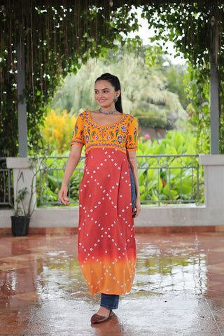 Yellow & Peach shade Navratri Special Printed Rayon Kurti with Kutchi Gamthi Embroidery & Pan Neck ClothsVilla