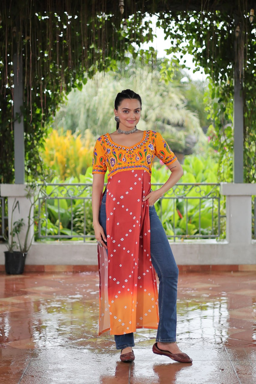 Yellow & Peach shade Navratri Special Printed Rayon Kurti with Kutchi Gamthi Embroidery & Pan Neck Secondary image